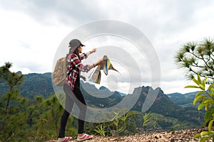 Hiker people woman feeling victorious facing and relax healthy on the mountain, Thailand.