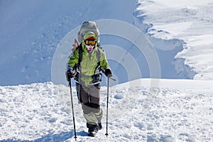 Hiker posing at camera on the trek in Himalayas, Nepal