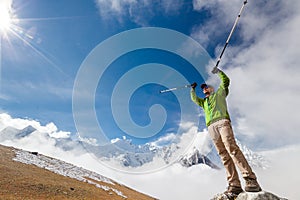 Hiker posing at camera on the trek in Himalayas, Nepal