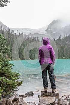 Hiker in Rain at Middle Joffre Lake