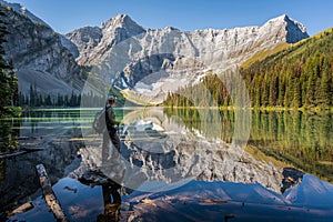 Hiker at Rawson Lake in Kananaskis Country, Alberta, Canada photo