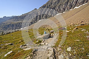 Hiker Relaxing on a Mountain Trail