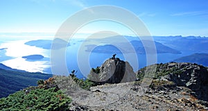 Hiker on the ridge of Mount Brunswick in Cypress Provincial Park