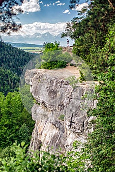 Hiker on the rock in Slovak paradise