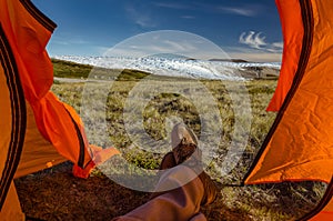 Hiker`s view from a tent towards the Greenlandic icecap