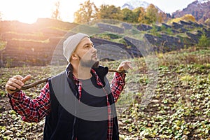 Hiker standing in front of a majestic mountain landscape