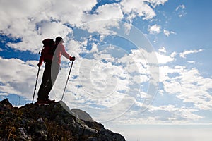 Hiker standing on the top of a mountain