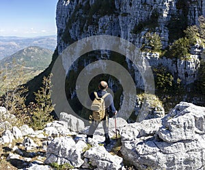 Hiker at summit of alburni massif