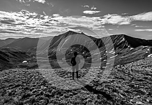 Hiker on the summit of Cupid Peak, Loveland Pass. Colorado Rocky Mountains