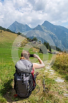 Hiker taking pictures. photo