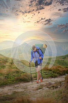 Hiker on the top in Carpathians mountains. Travel sport lifestyle concept