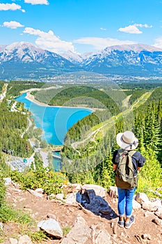 Staycation hike on top of mountain overlooking local town of Canmore and Kananaskis photo