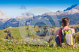 Hiker on the top of the mountains at Dolomites, South Tyrol. Italy, Europe