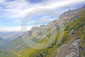 Hiker Traveling on a Remote Alpine Trail