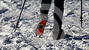 Hiker on the trek equipped with crampons