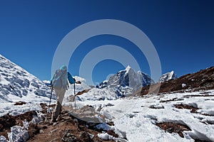 Hiker on the trek in Himalayas