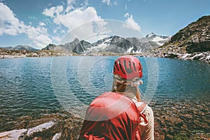 Hiker trekking at blue lake in mountains Travel Lifestyle adventure concept