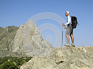 Hiker trekking in the mountains.