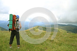 Hiker trekking in the mountains.