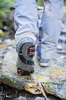 Hiker trekking in the mountains. Sport and active life.