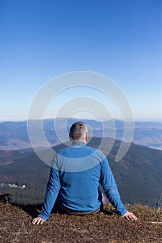 Hiker trekking in the mountains. Sport and active life.