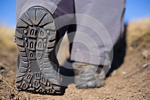 Hiker trekking in the mountains. Sport and active life.