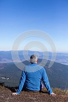 Hiker trekking in the mountains. Sport and active life.