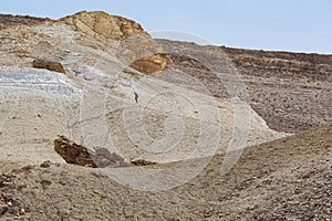 Hiker Trudging up a Steep Desert Trail in the Negev in Israel