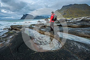 Hiker at Uttakleiv beach on Lofoten island