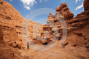 Hiker visit Goblin valley state park in Utah, USA