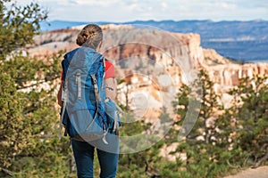 Hiker visits Bryce canyon National park in Utah, USA photo