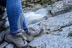 Hiker walking near the Rui stream, Mel, Belluno, Italy