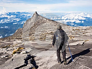 Hiker Walking at the Top of Mount Kinabalu in Sabah, Malaysia