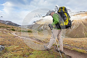 Hiker walks on train