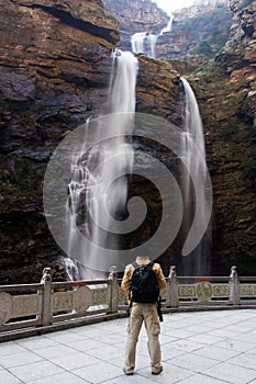 Hiker with Waterfall