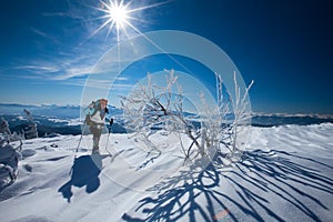 Hiker in winter mountains