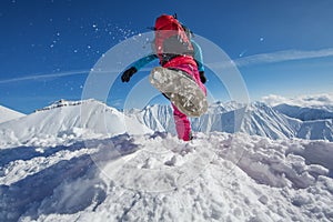 Hiker in winter mountains