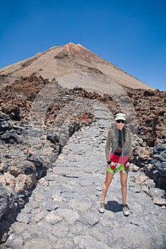 Hiker woman and Teide volcano