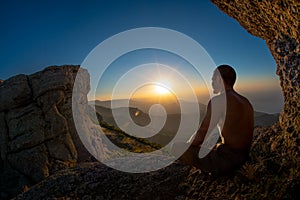 Hiker yogi meditate on beauty mountain landscape background