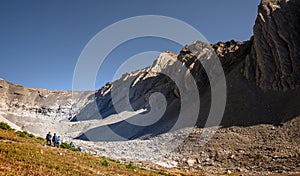 Hikers adventuring along ptarmigan cirque photo