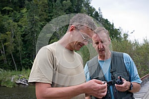 Hikers check the operating status of walkie-talkie