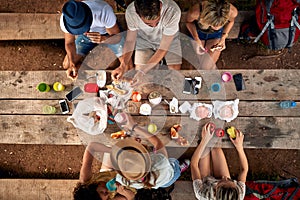 hikers enjoy at food after a long walk in the woods