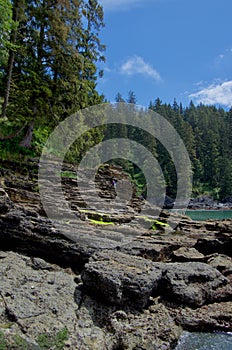 Hikers enjoy the rocky coast near Sombrio Beach, Vancouver Island photo