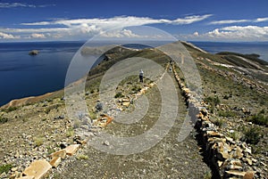 Hikers on Inca Trail on Isla del Sol with Titicaca photo