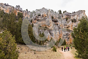 Hikers by amazing karstic mountains