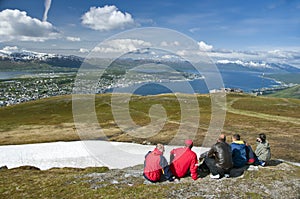 Hikers looking at Tromso city