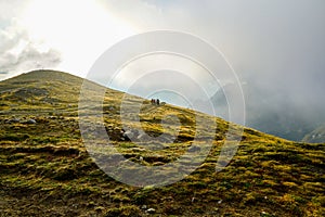 Hikers on Omu Peak, Bucegi Mountains, Romania