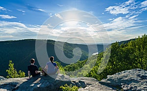 Hikers on Raven Rock in Coopers Rock State Forest WV