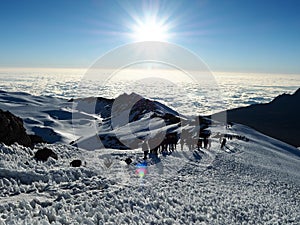 Hikers on the ridge ascend mount kilimanjaro the tallest peak in africa