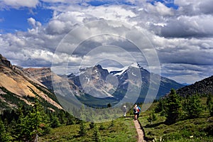 Hikers in Rockies mountains